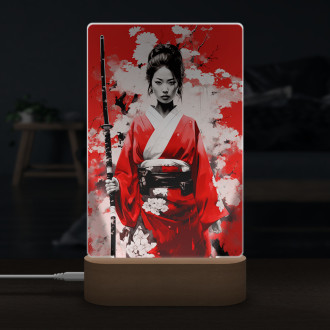 Lampa dievča s kimonom na červenom pozadí