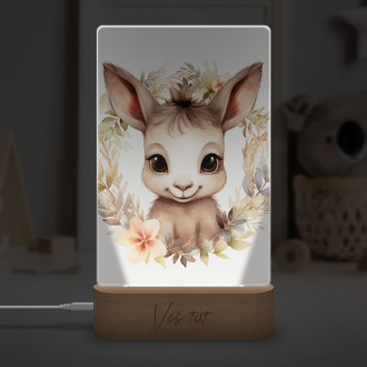 Lampa Mláďa osla v kvetoch